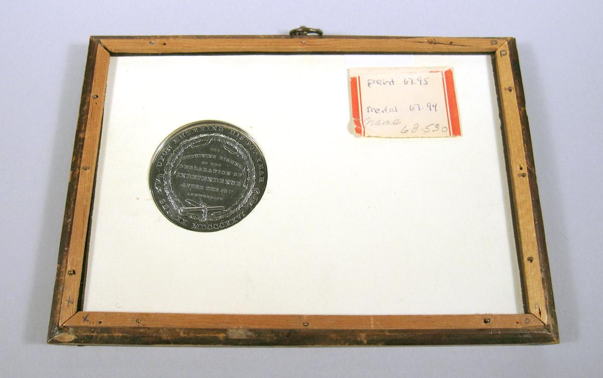1967.0094 Medal, 1968.0530 Frame, underside