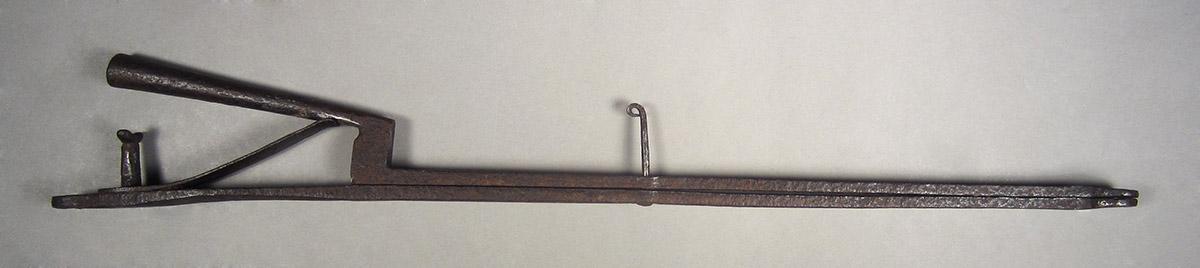 1957.0026.486, Pipe tongs, side 1