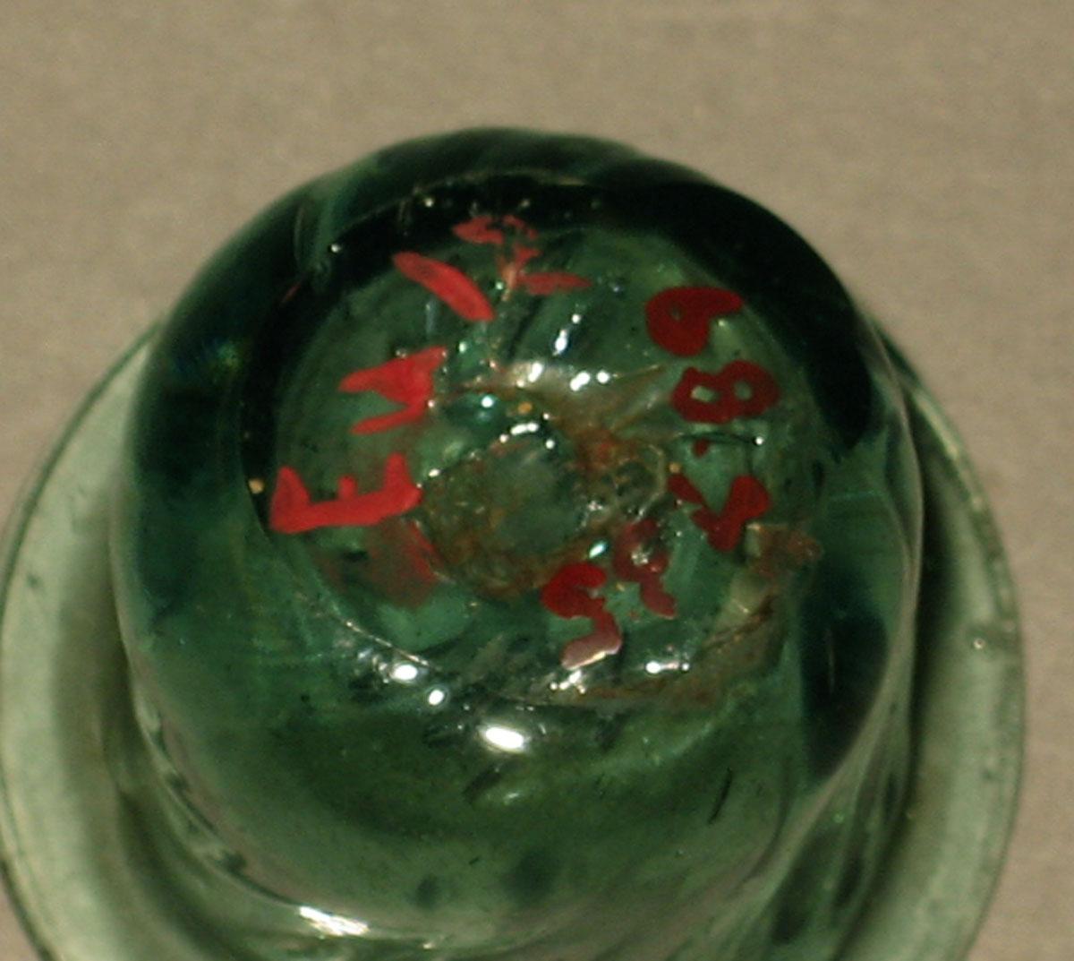 1968.0735 Glass inkwell (underside)