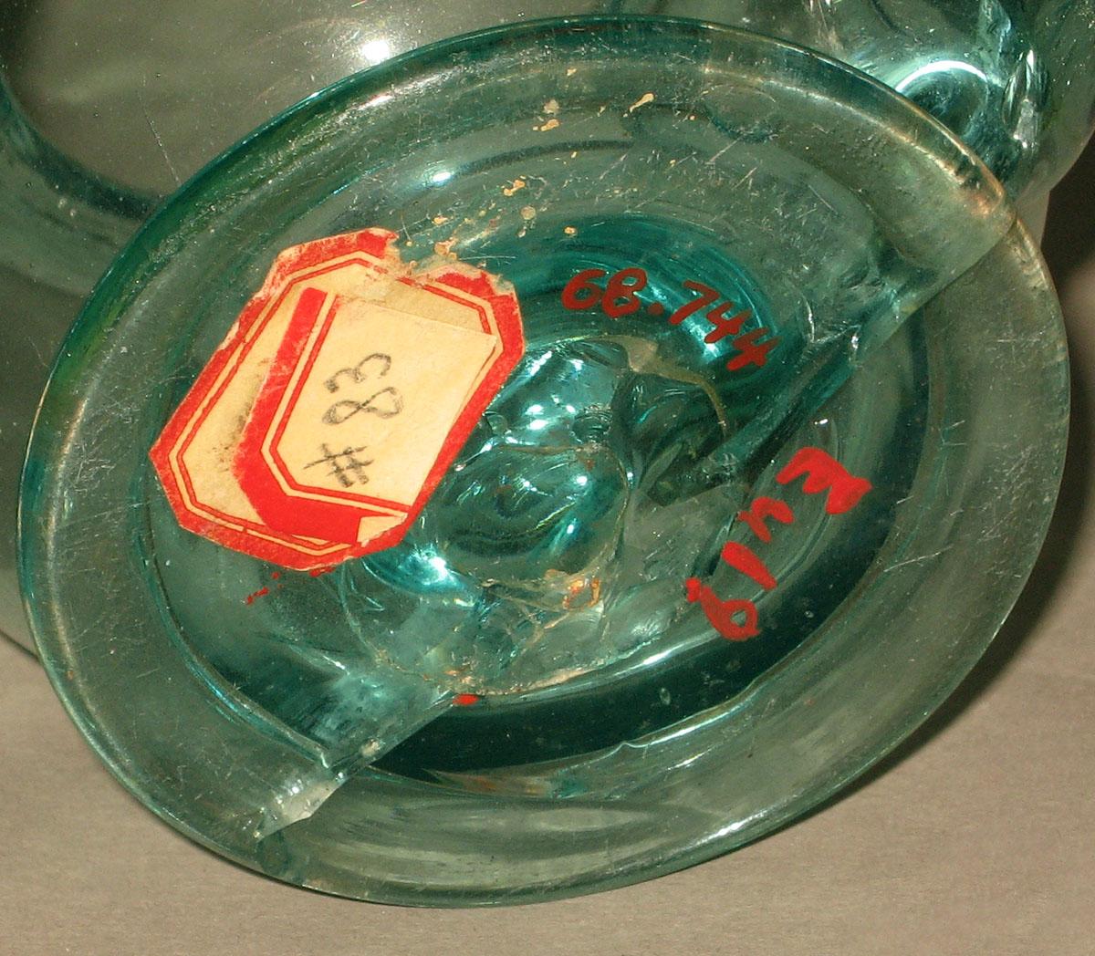 1968.0744 Glass lamp filler (underside)