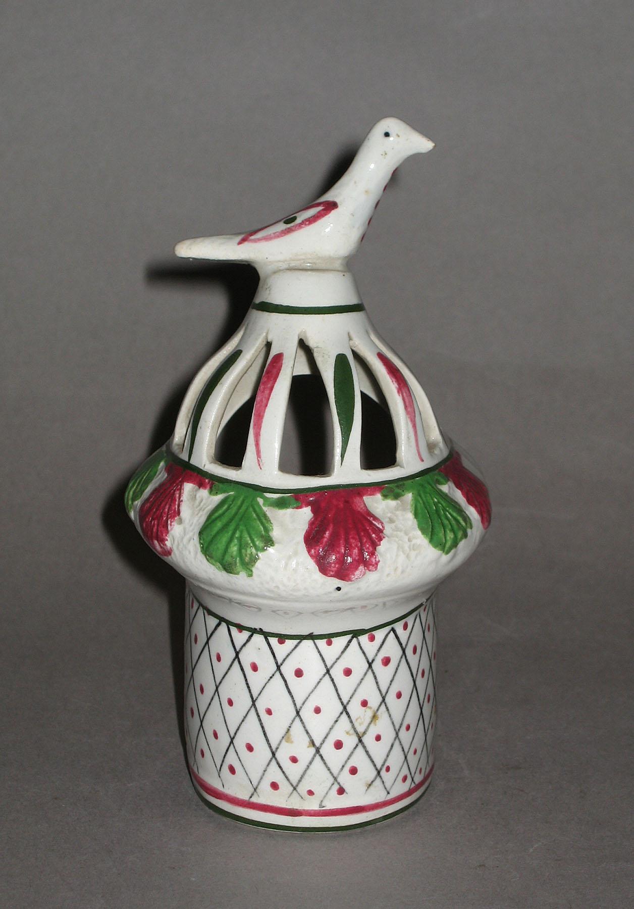 1968.0760 Earthenware bird feeder