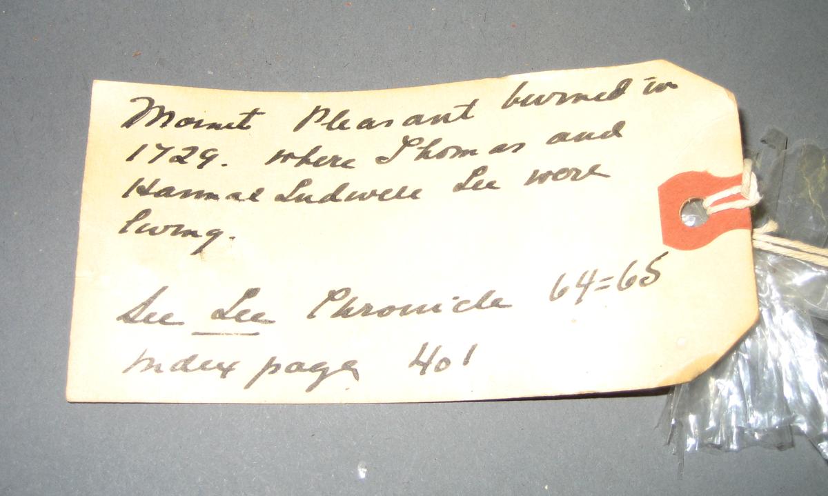1969.0052 Brick (tag, opposite side)