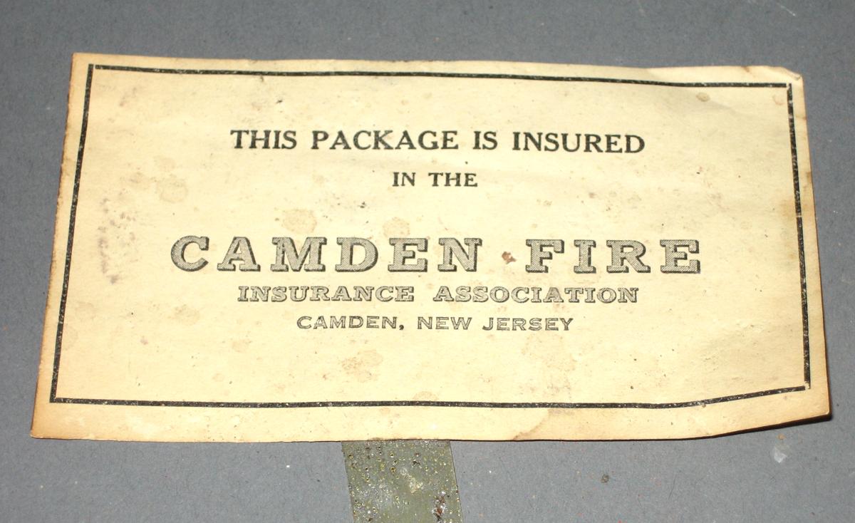 1969.0052 Brick (printed tag)