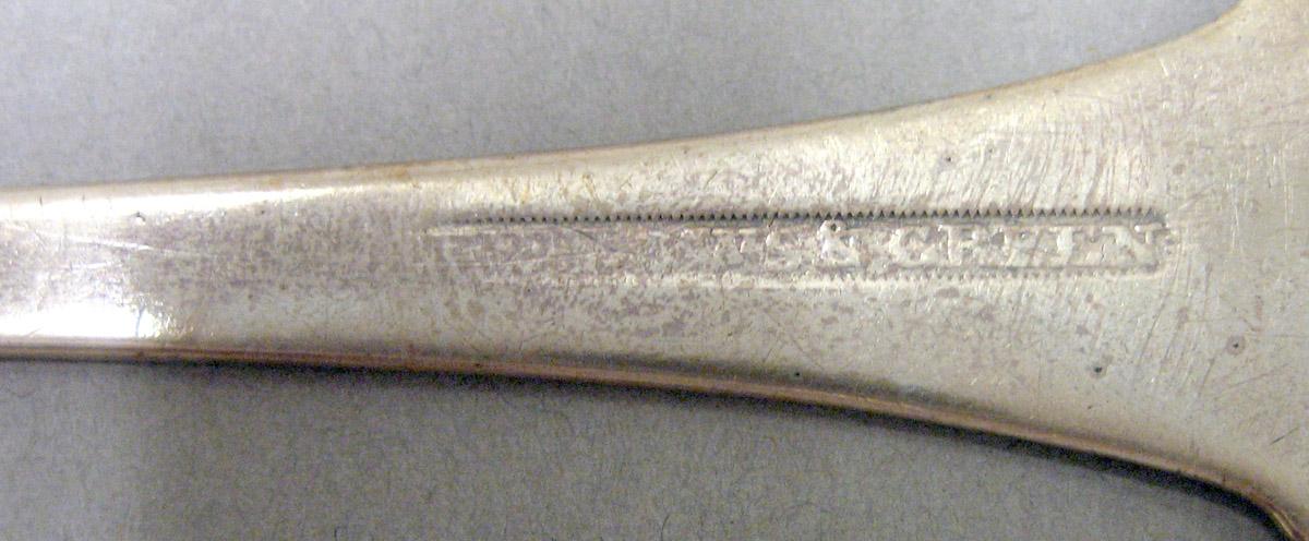 1969.0086 Teaspoon mark