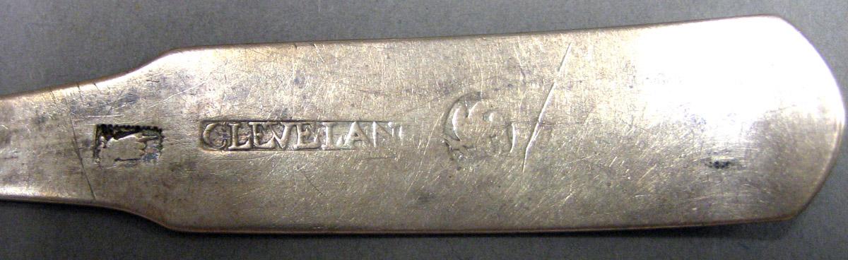 1969.0089 Teaspoon mark