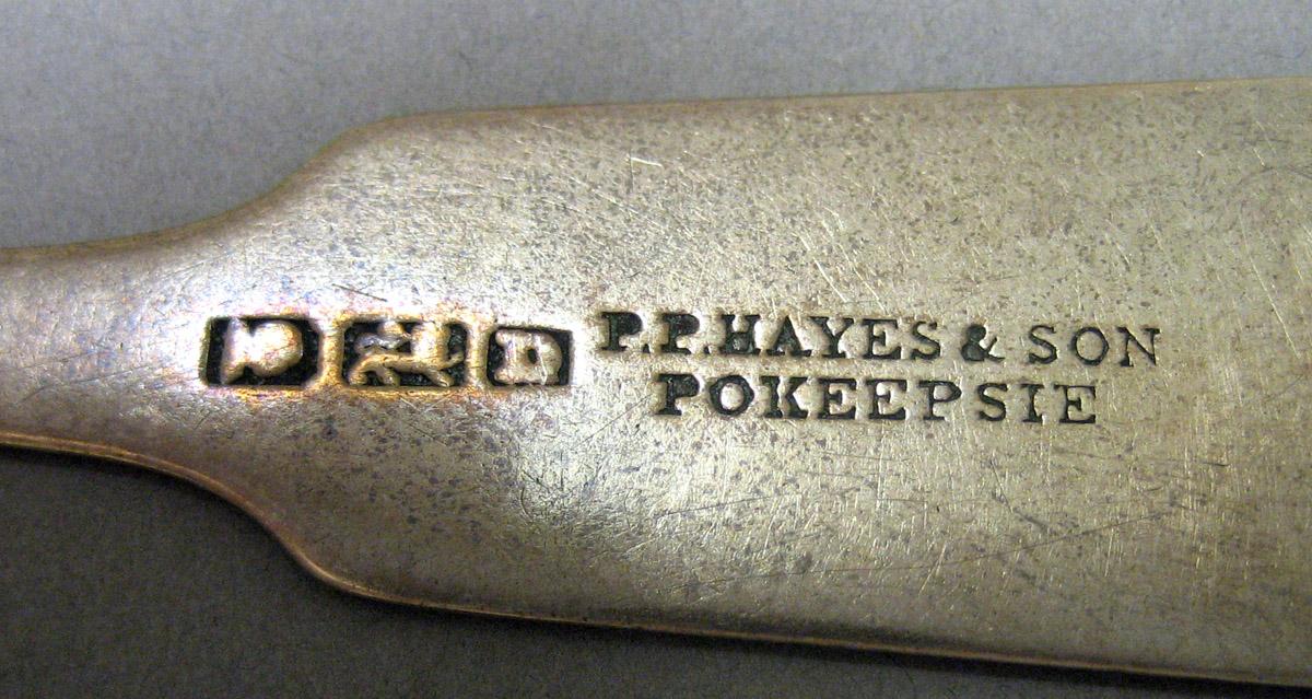 1969.0092 Teaspoon mark