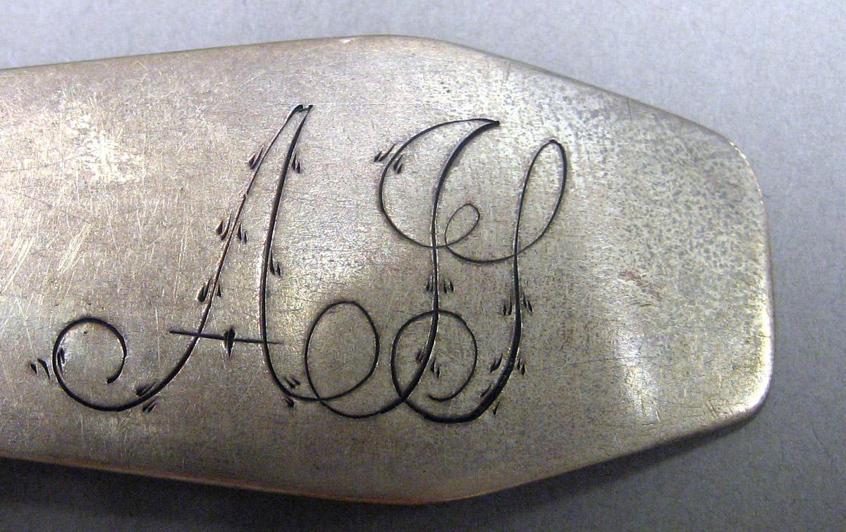 1969.0093 Tablespoon engraving