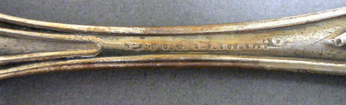 1969.0119  Salt spoon mark