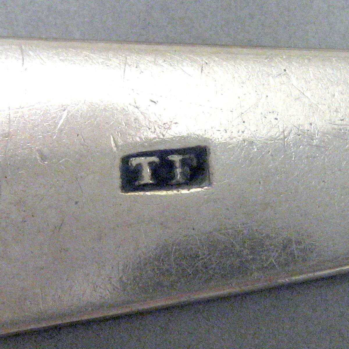 1969.0124 Tablespoon mark