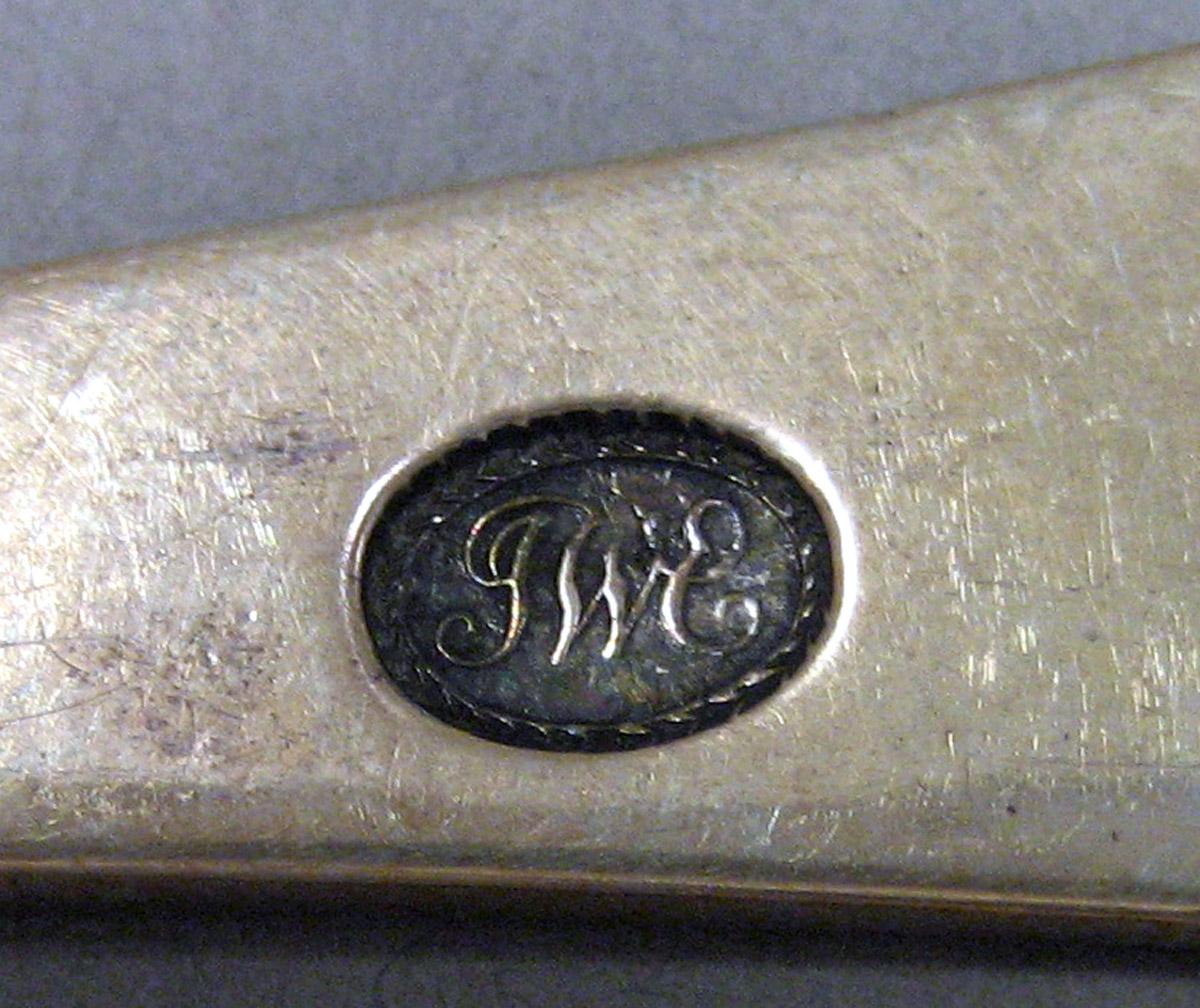 1969.0125 Tablespoon mark