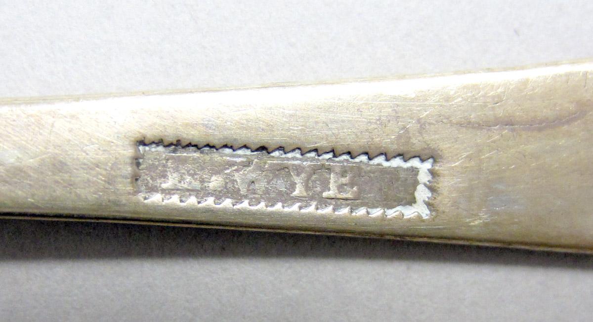 1969.0128 Spoon mark