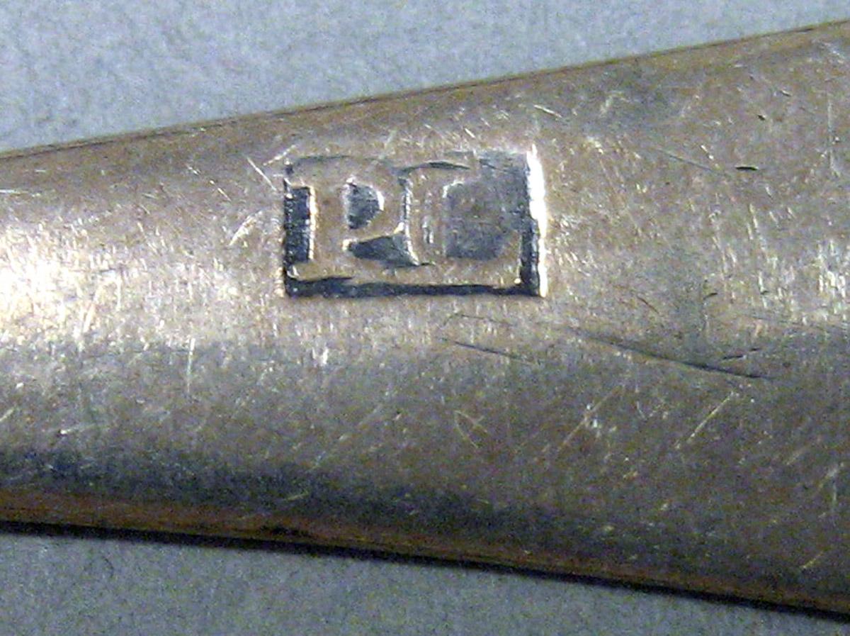 1969.0129 Spoon mark