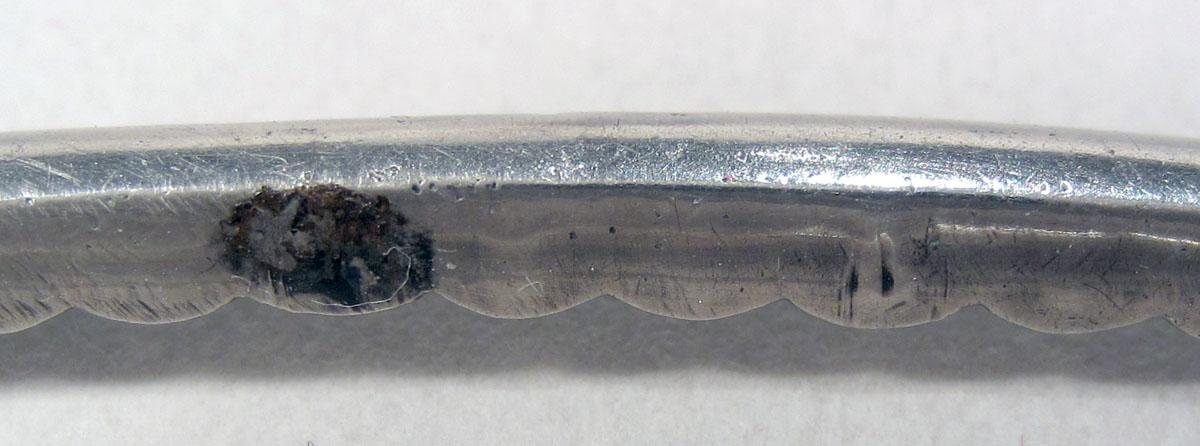 1969.0166 Buckle possible marks