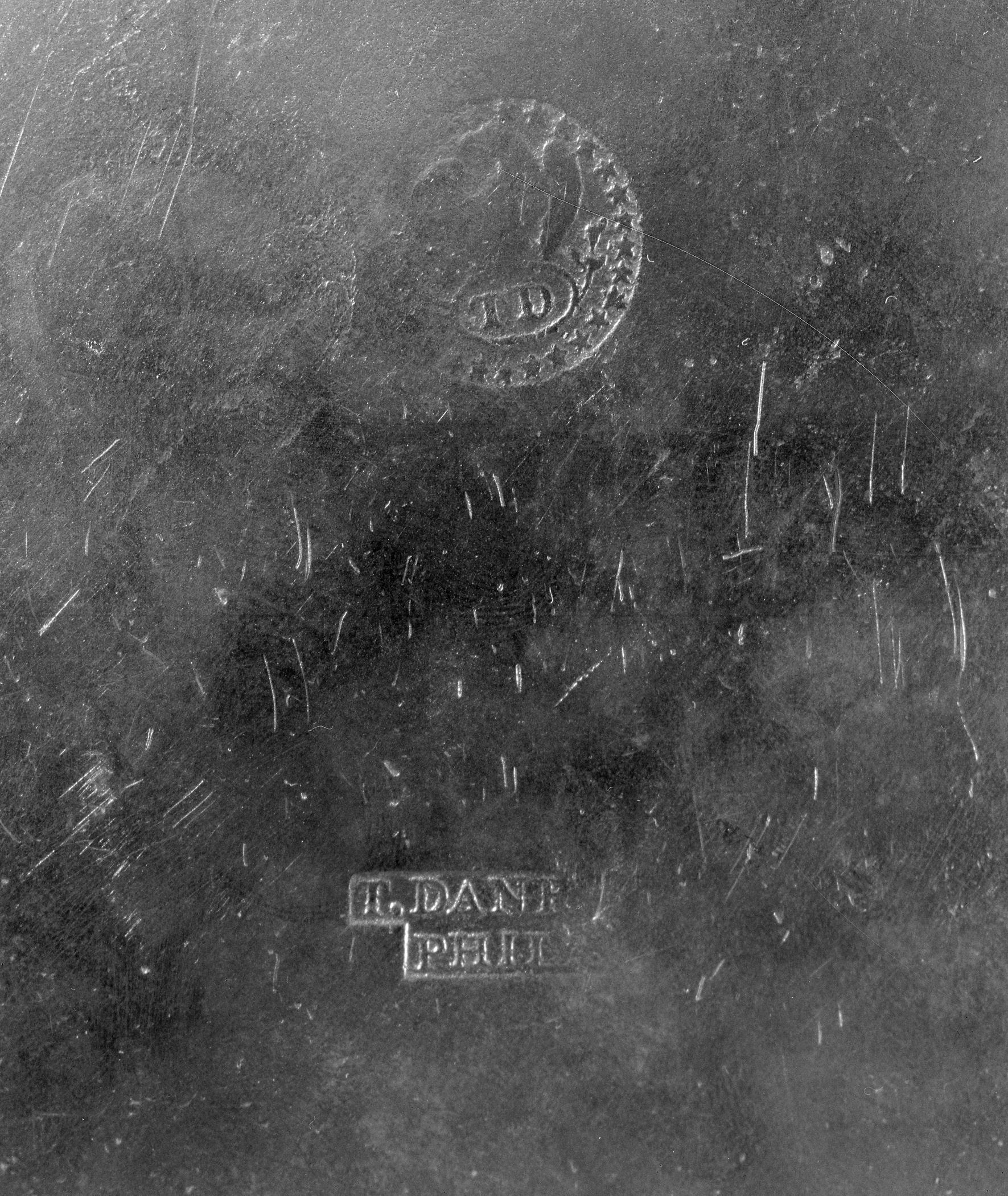 1969.0203 Pewter plate (marks)