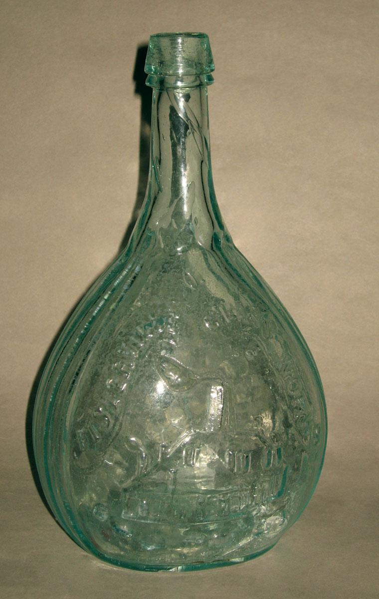 1969.0215 Glass Jenny Lind bottle (op.side)