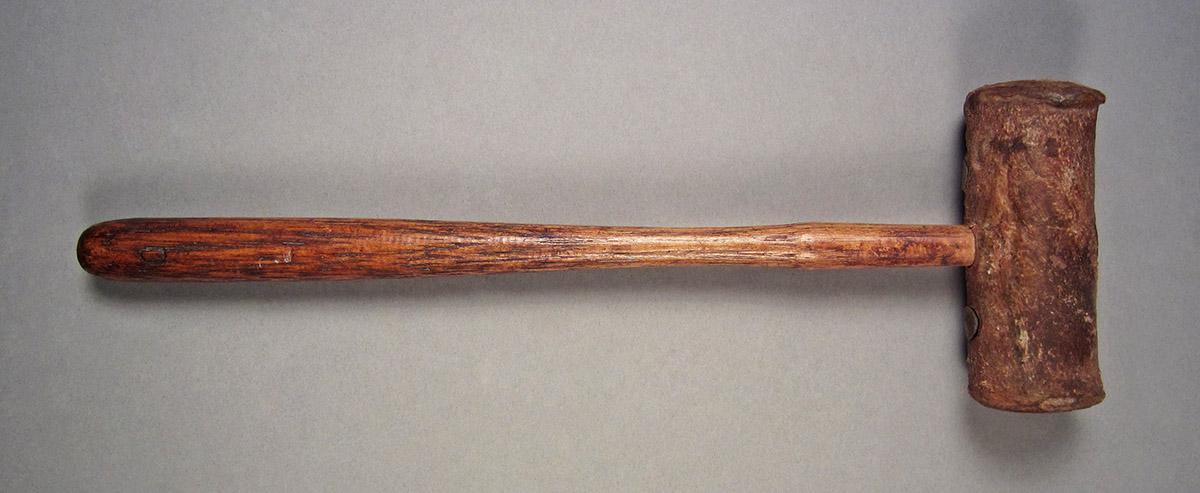 1957.0026.561, Mallet, side 1