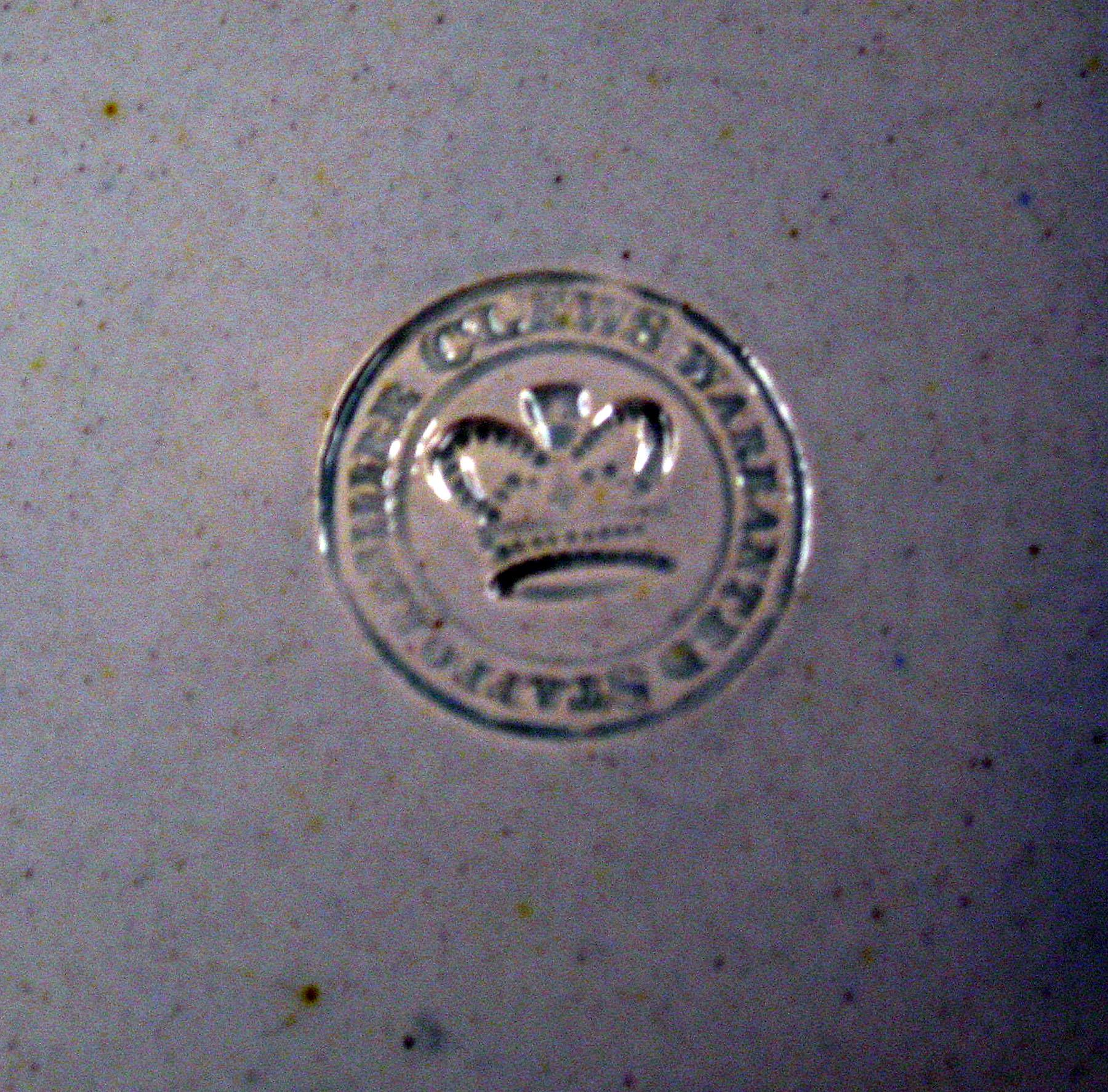 1969.0338.008 Pearlware plate (detail)