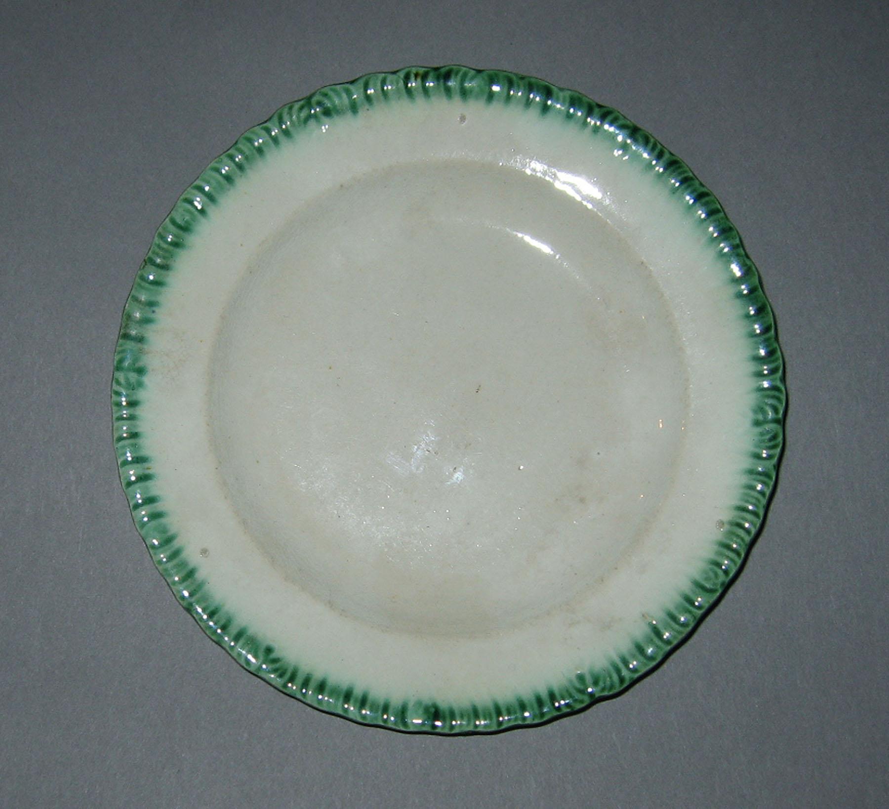 1969.0351.001 Wood pearlware plate