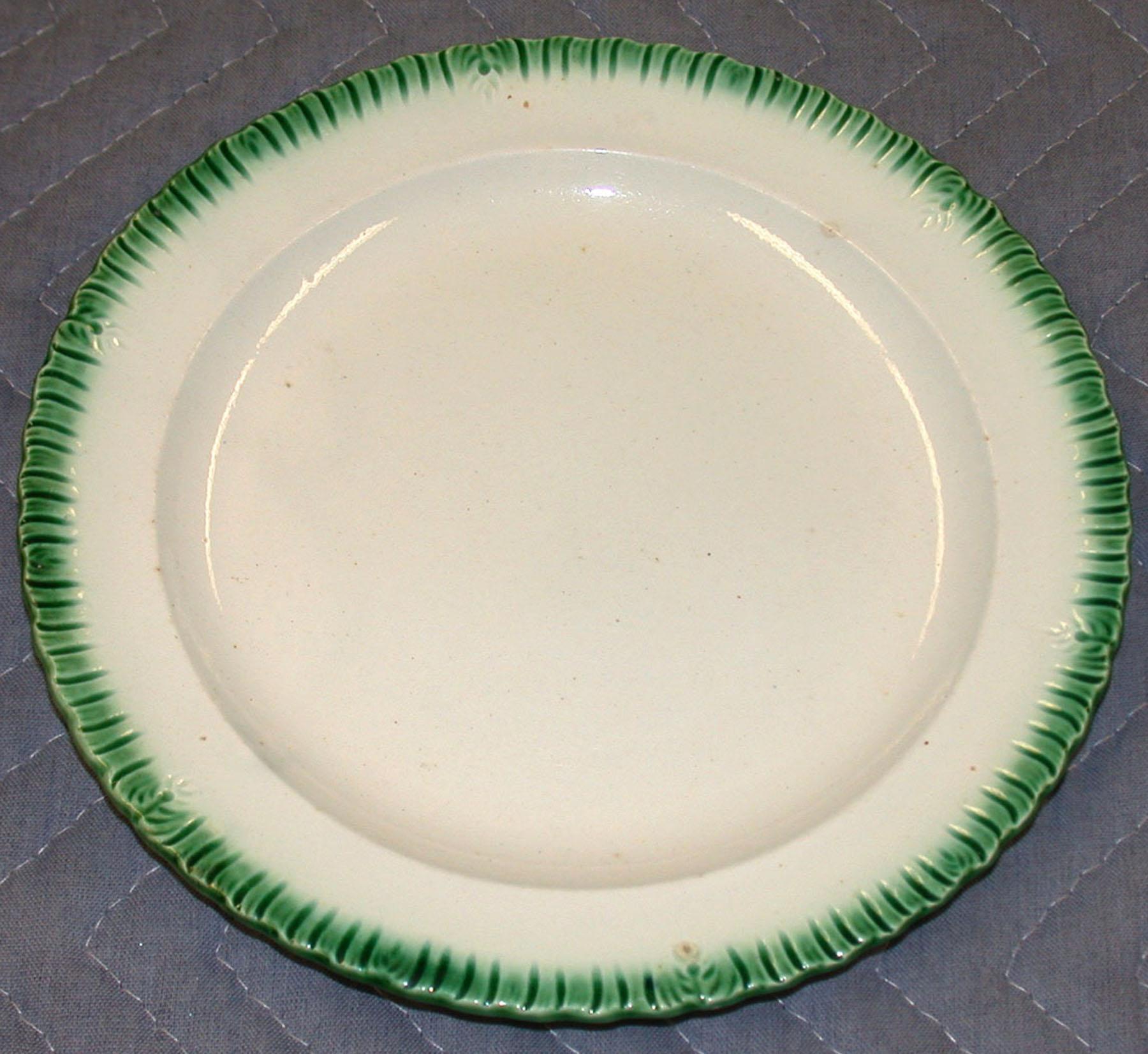 1969.0351.002 Pearlware Wood plate