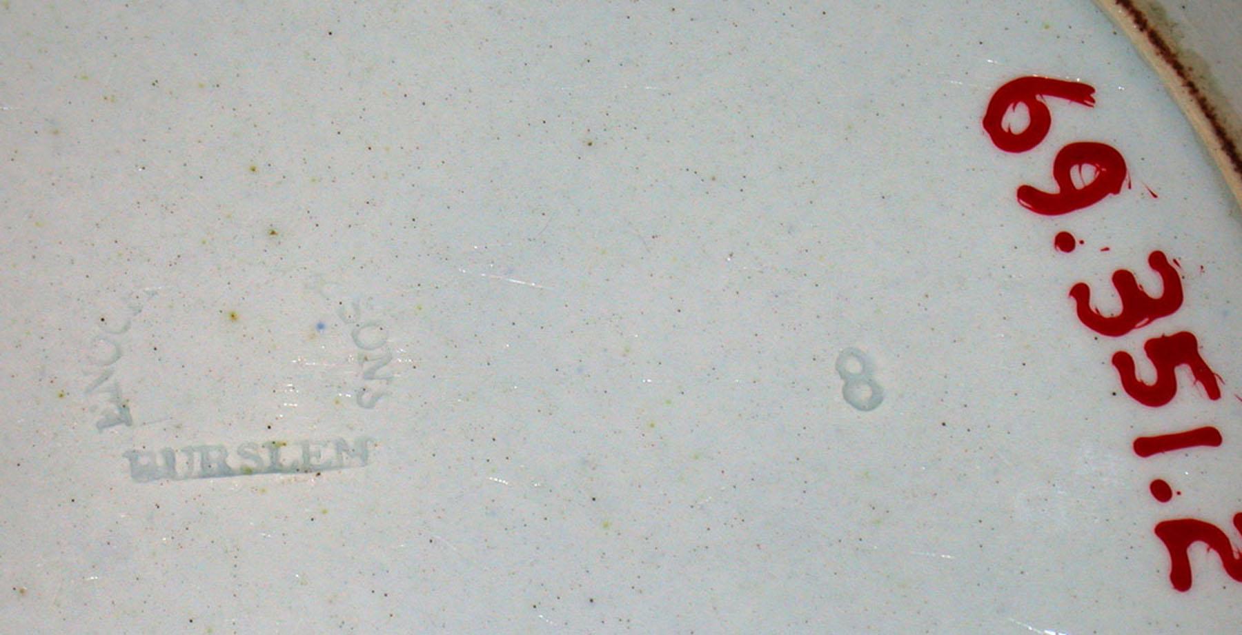 1969.0351.002 Pearlware Wood plate (marks)