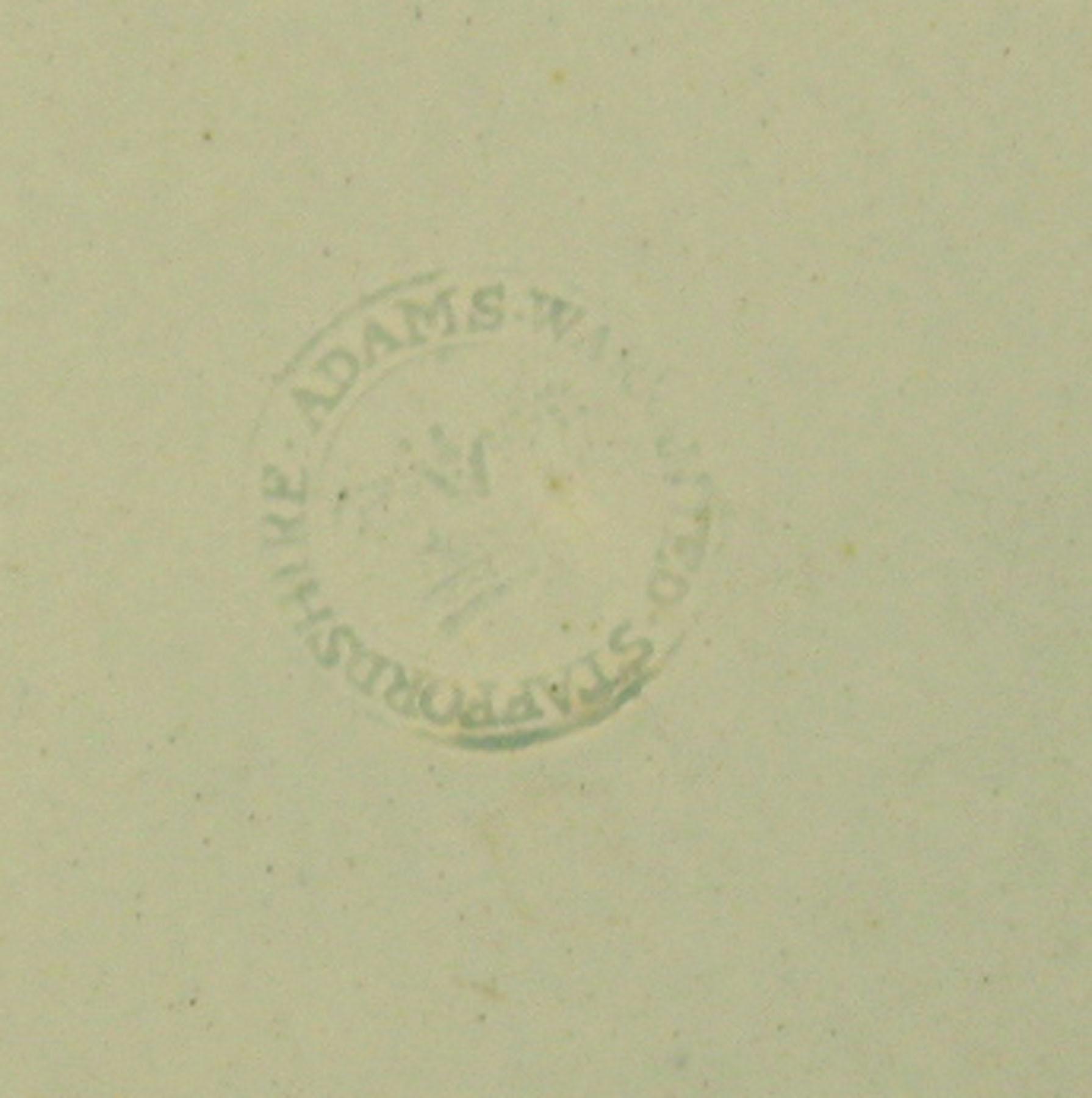 1969.0364.002 Pearlware W.Adams marked soup plate (detail)