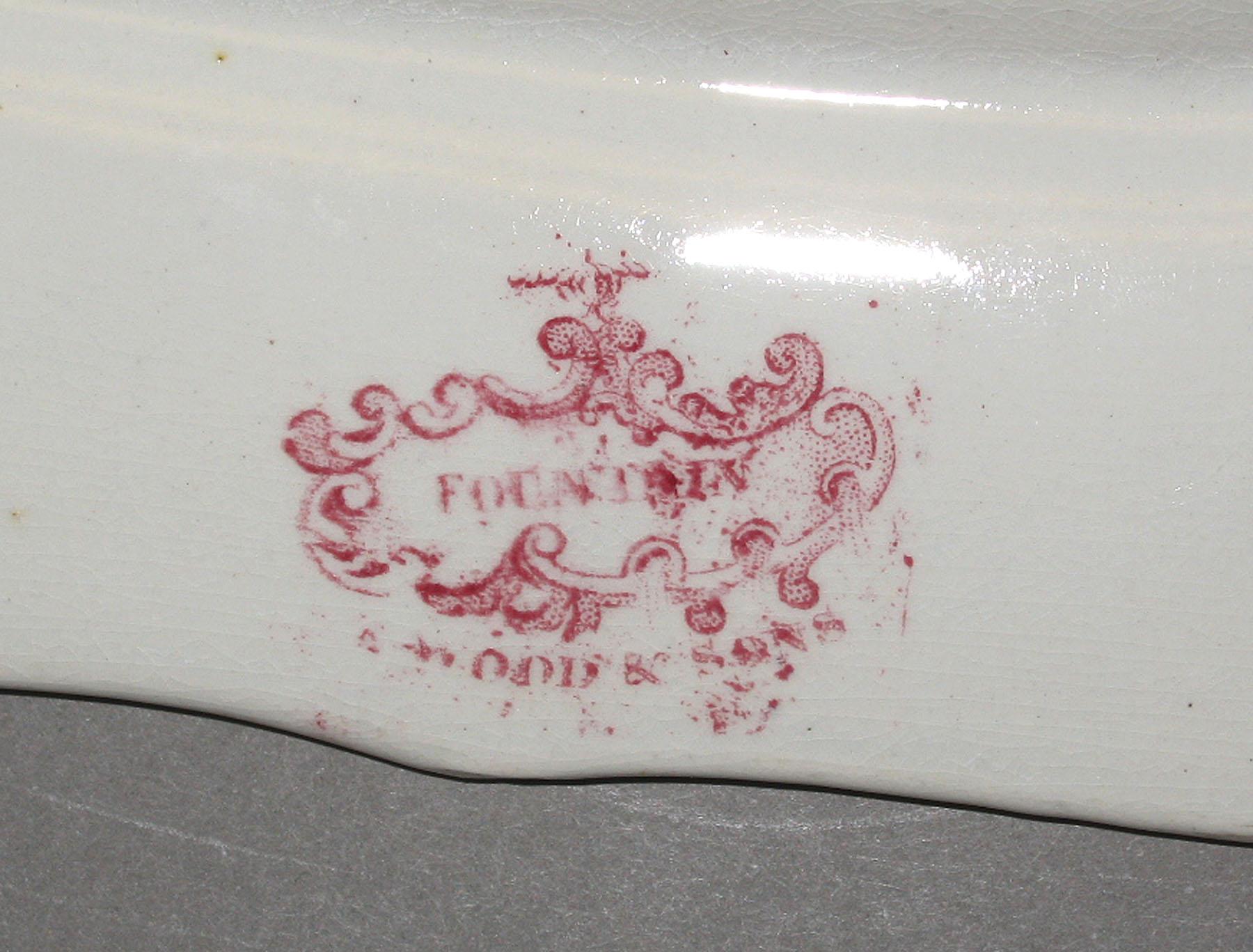 1969.0378.001 Wood earthenware platter, detail