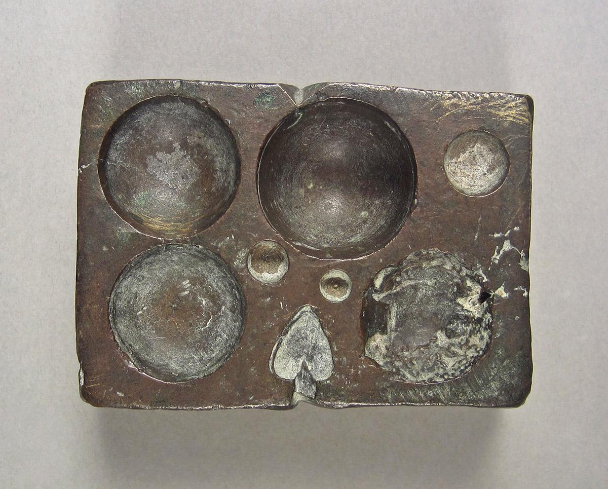 1957.0026.585, Shot gauge, side 1