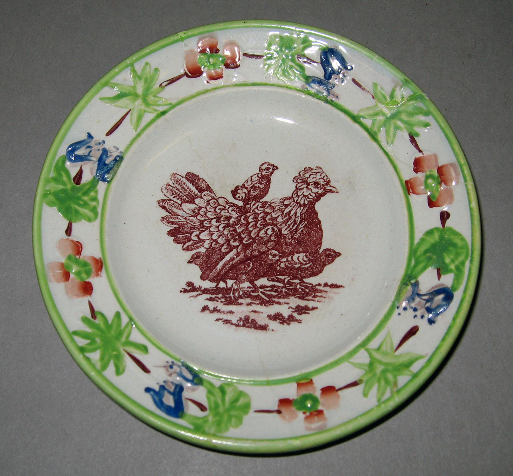 1969.0385 Wood earthenware plate