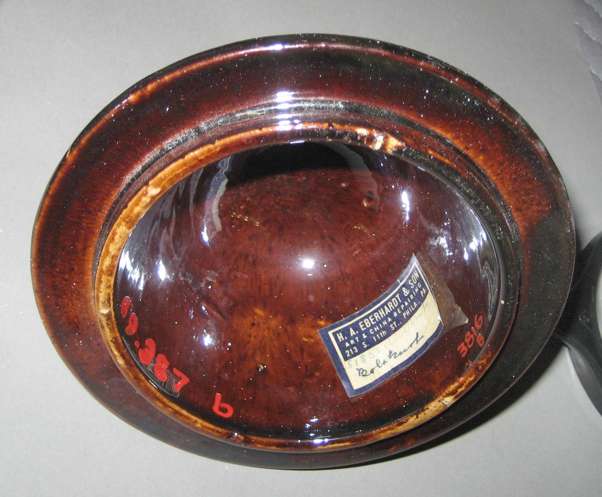 1969.0387 Earthenware teapot lid detail