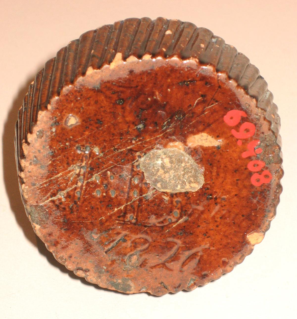 1969.0408 Inkwell (inscription)