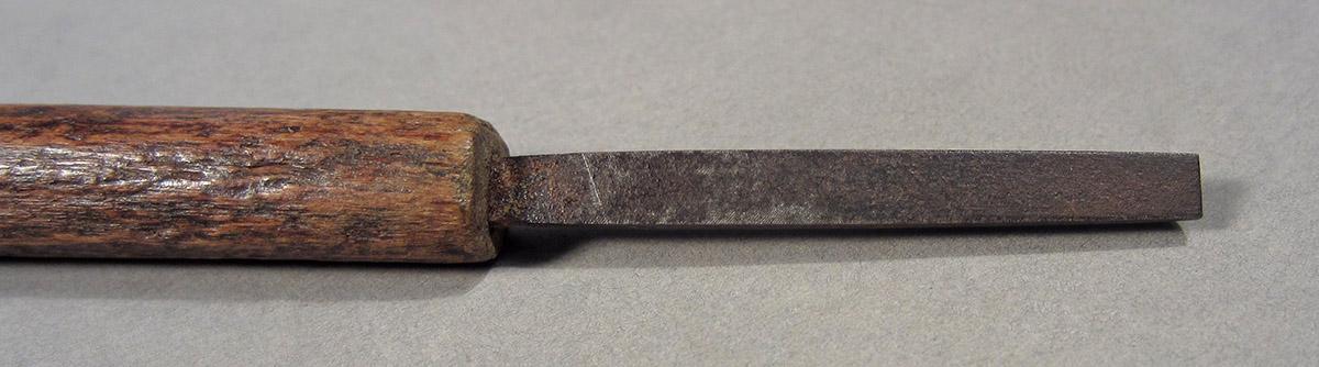 1957.0026.599, File, blade side 1