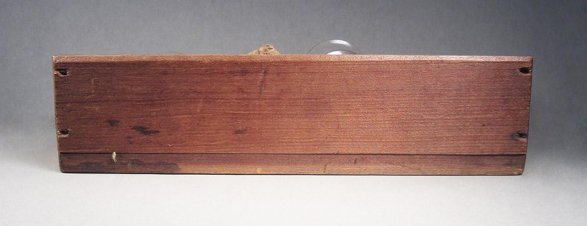 1957.0026.607, Box of watch crystals, front
