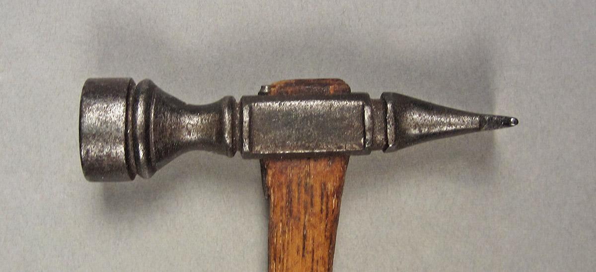 1957.0026.611, Hammer, head side 1