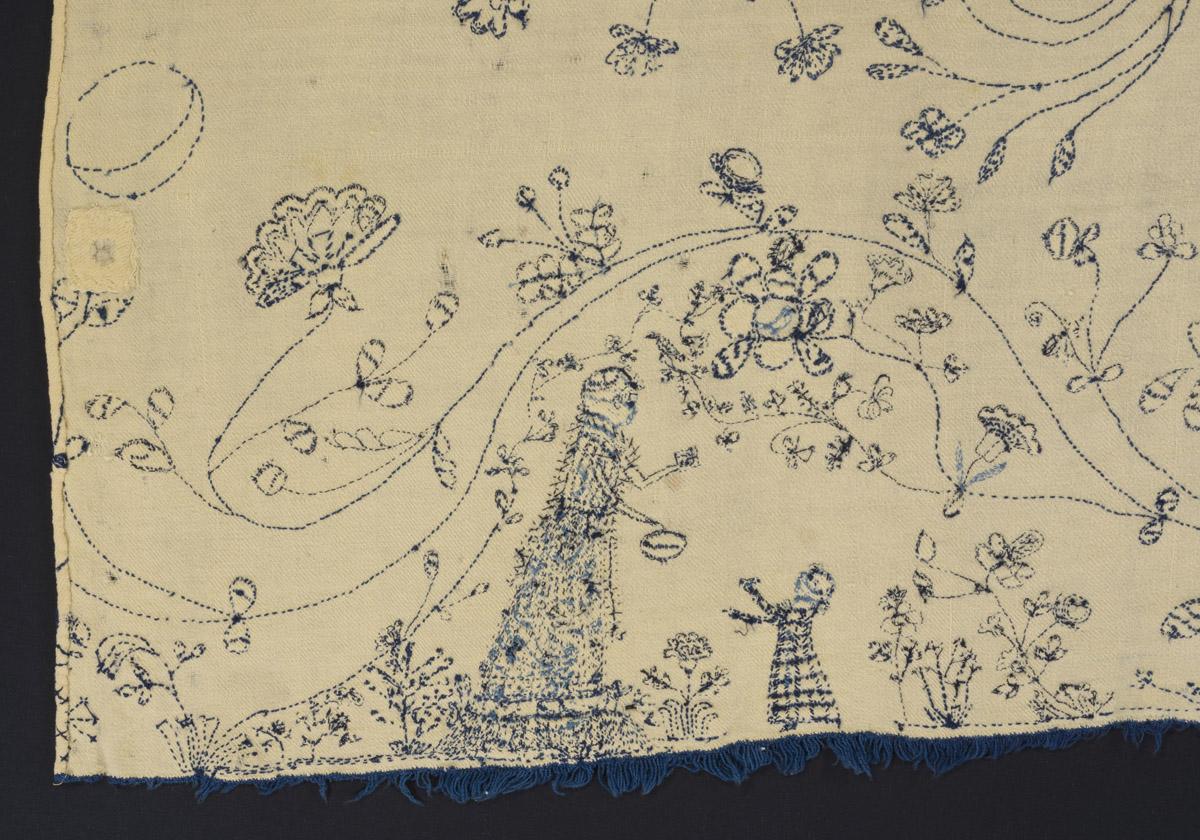 1969.0558 Bedcover, reverse, detail 1, before conservation treatment