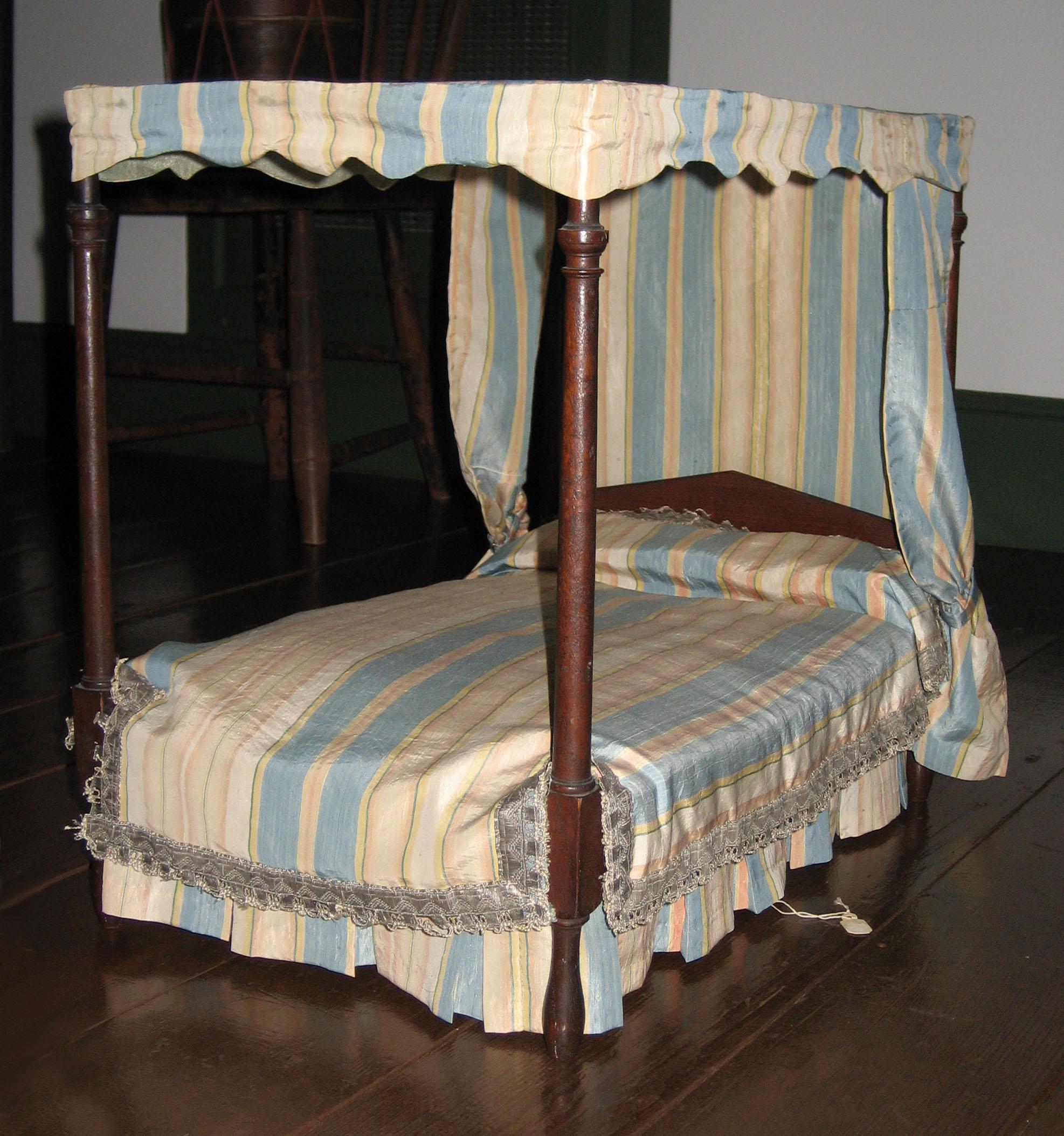 1969.0619 Miniature bedcover and bed hangings view 1