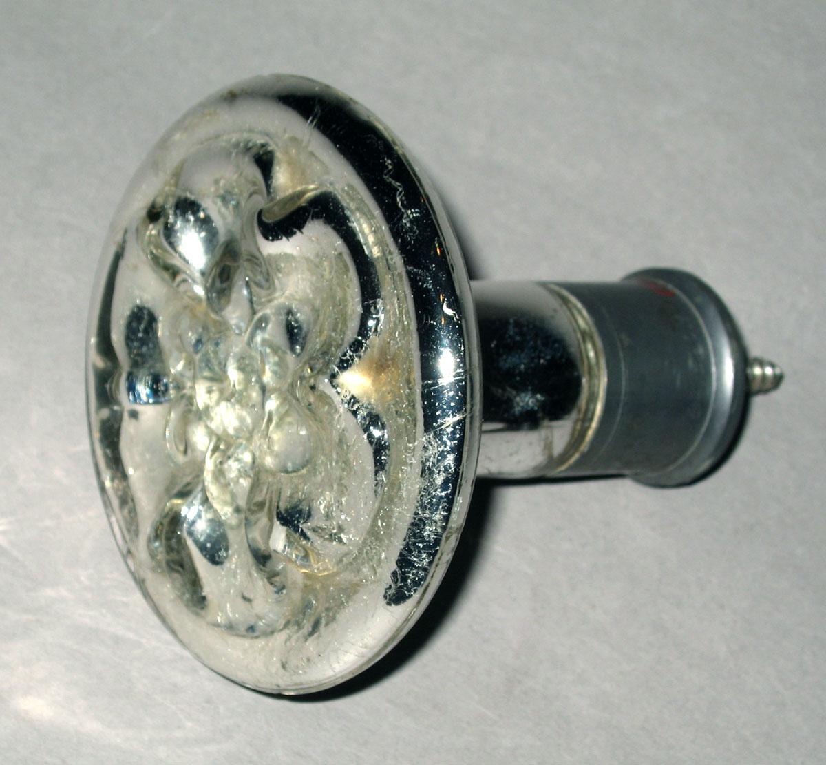 1969.0680.001 Mercury glass and petwer tieback
