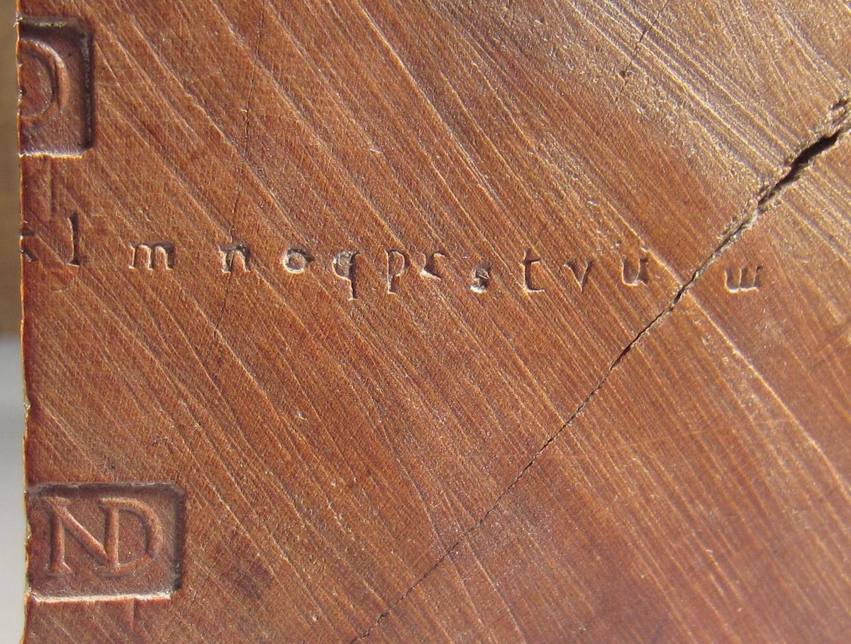 1957.0026.648 Die stamp block, Marks