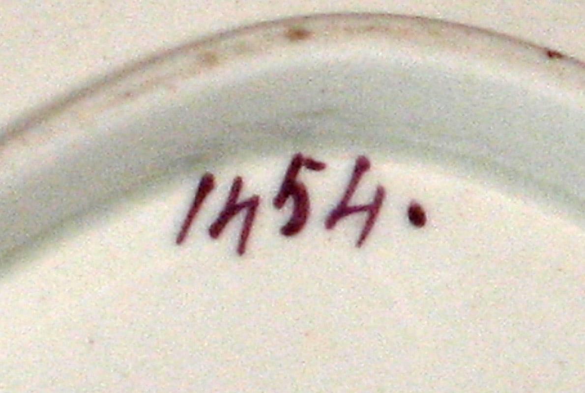 1969.0736.064 dish inscription