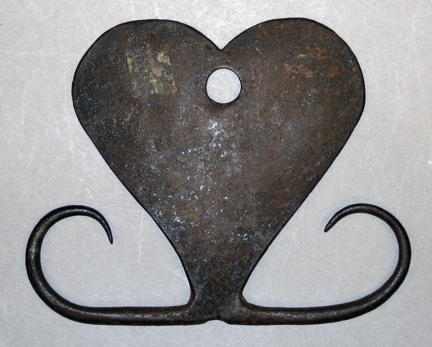 1969.0836 A Skewer holder