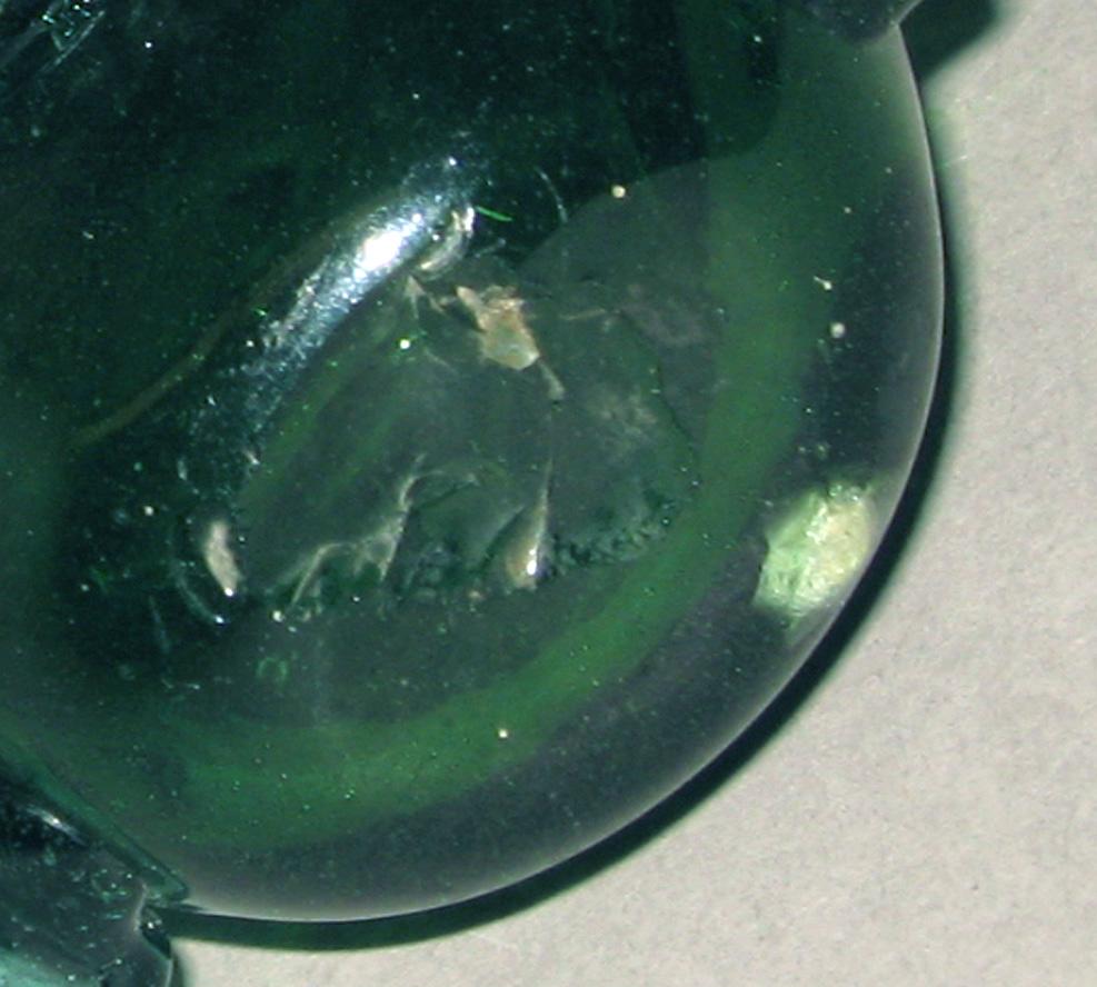 1969.0845 Glass flask (underside)