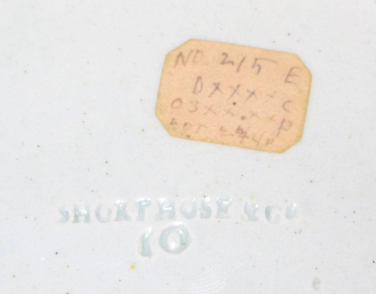 1969.0858.001 A Pearlware basket mark and label