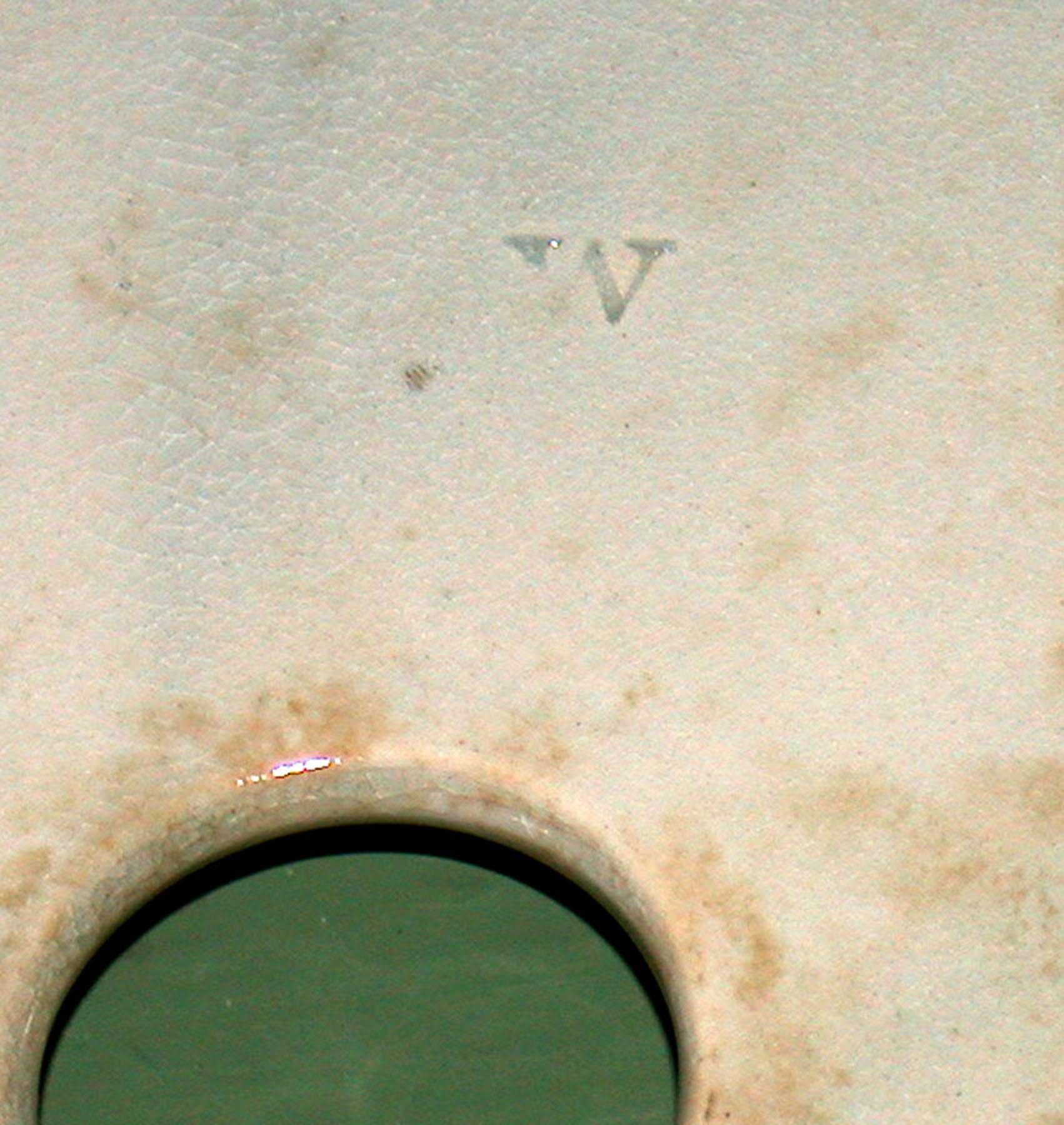 1969.0869 Pearlware drainer (mark)