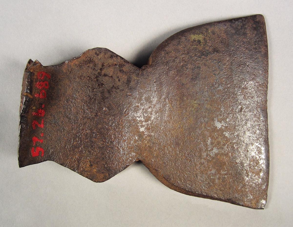 1957.0026.689 Broadaxe head, side 1