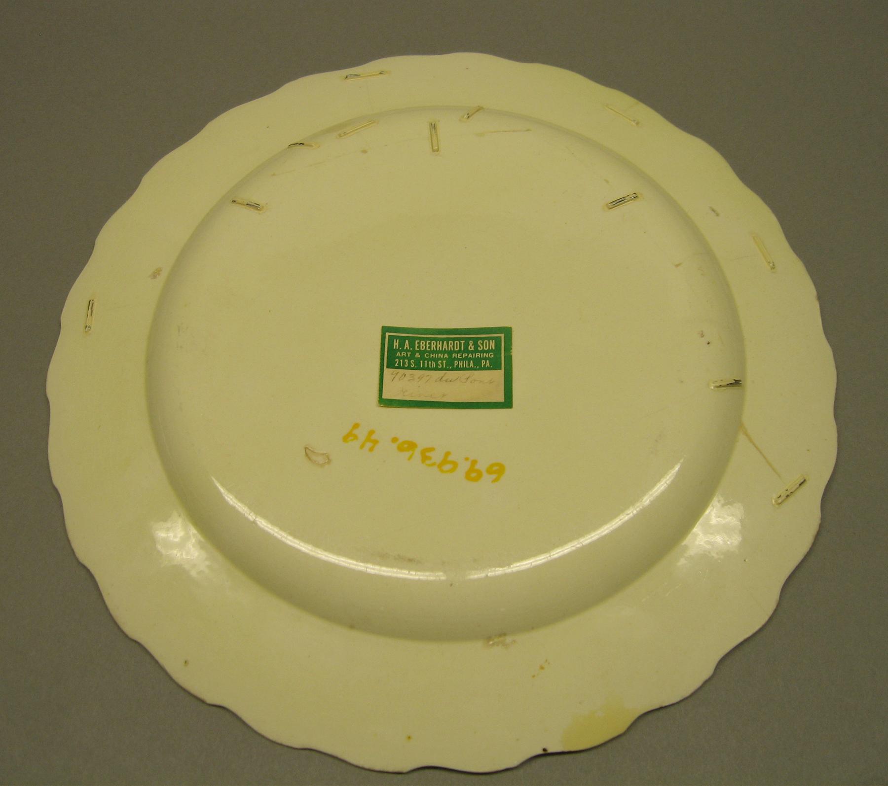 1969.0936.049 Plate underside repair