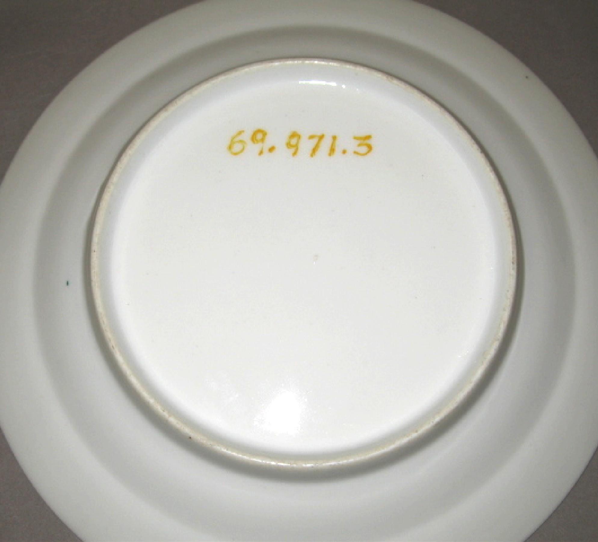 1969.0971.003 French porcelain soup plate (underside)