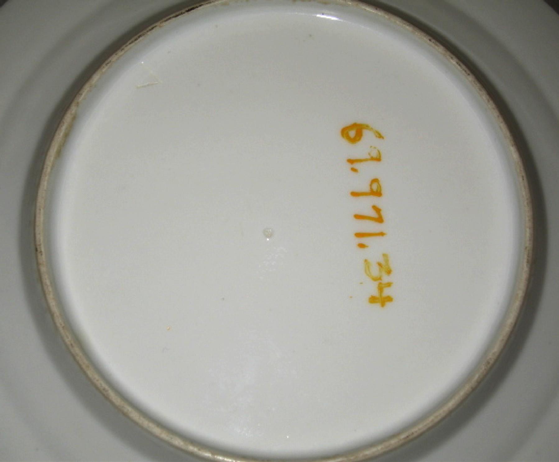 1969.0971.034 French porcelain plate (underside)