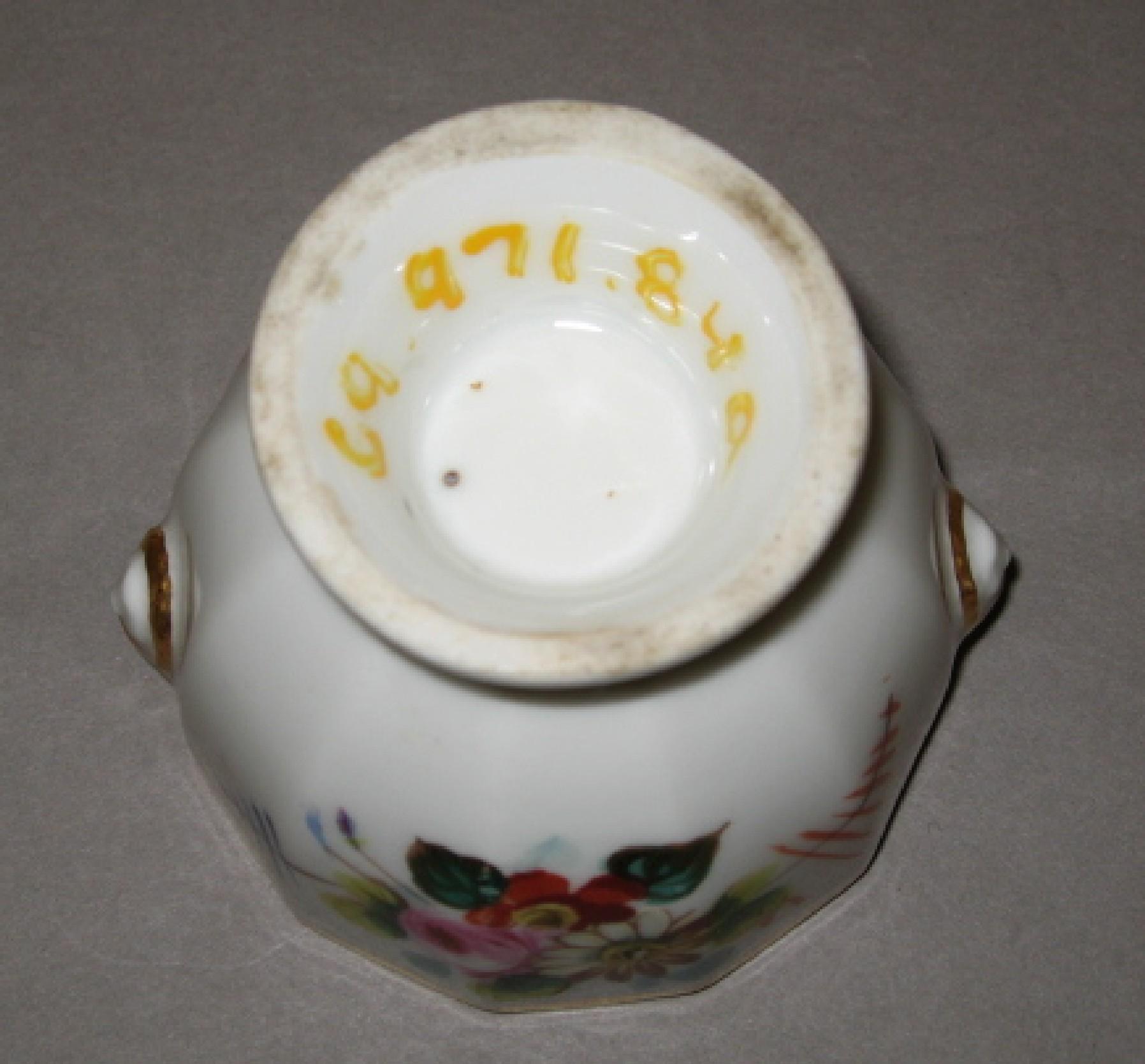 1969.0971.084 A, B French porcelain custard cup (underside)