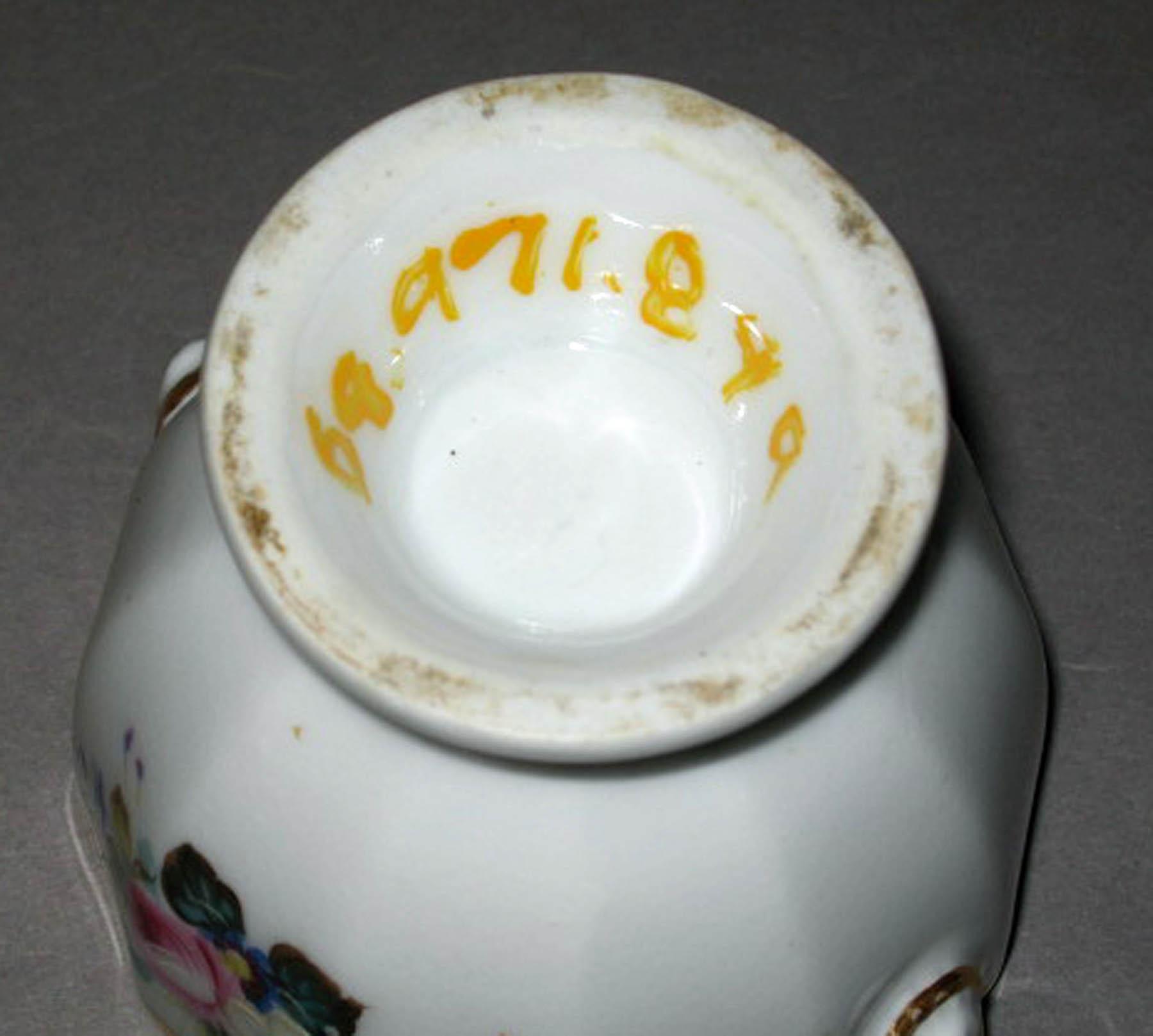 1969.0971.089 A, B French porcelain custard cup (underside)