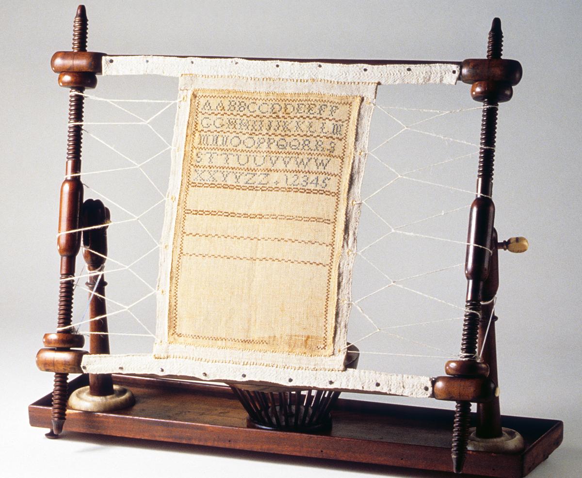 1958.2974, 1969.1111 Embroidery Stand and Sampler