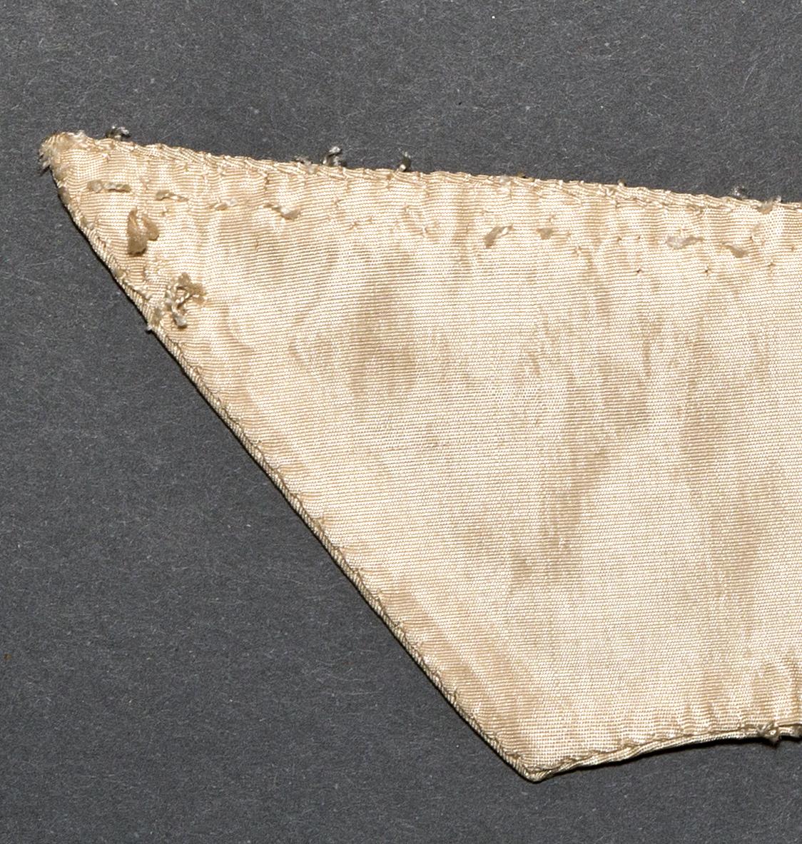 1969.1117 C Pocket Flap, Verso Detail